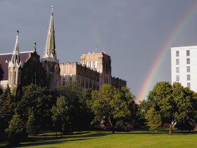 A rainbow appears over the Creighton University campus following a storm.