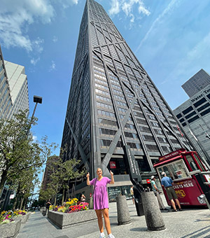 Mary Ascher in front of Hancock Building in Chicago