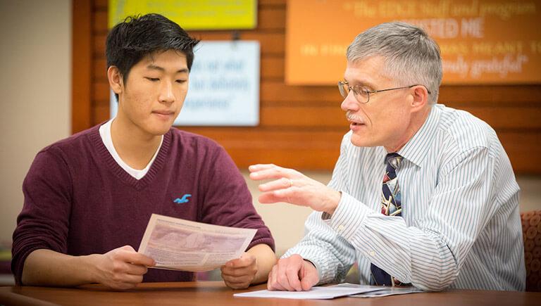 A pre-professional advisor speaking to a student