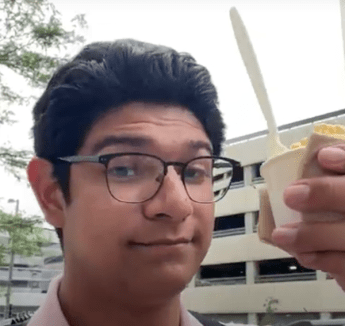Aaron Rivera holding up ice cream dish 