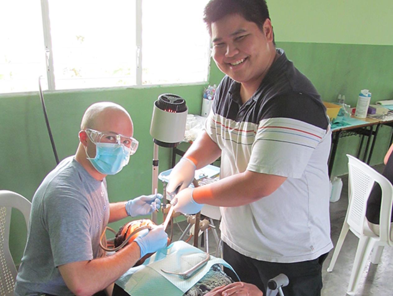 ILAC dental student working on patient