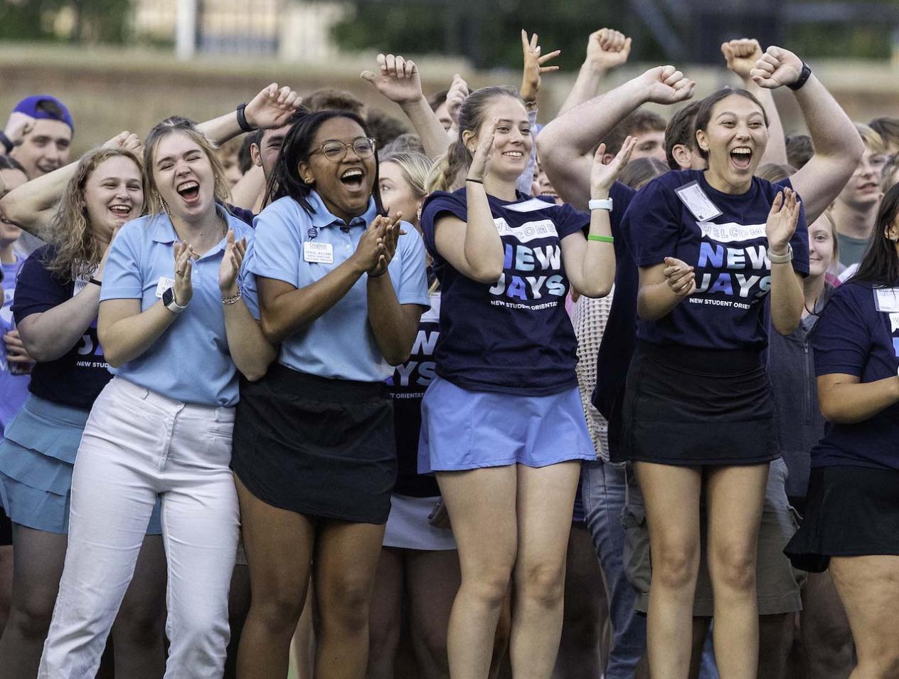 Students cheering at Move-In weekend activities.