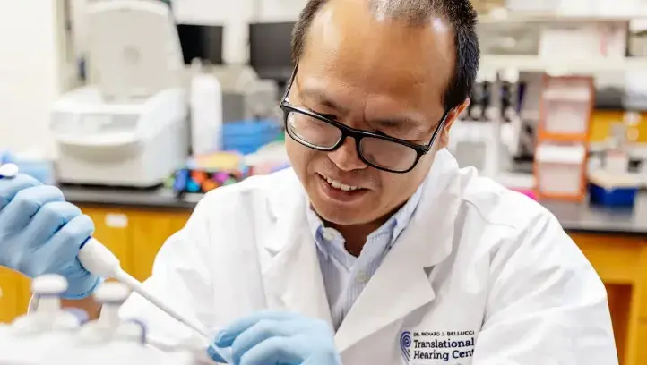 Tao Nih in action in the lab.