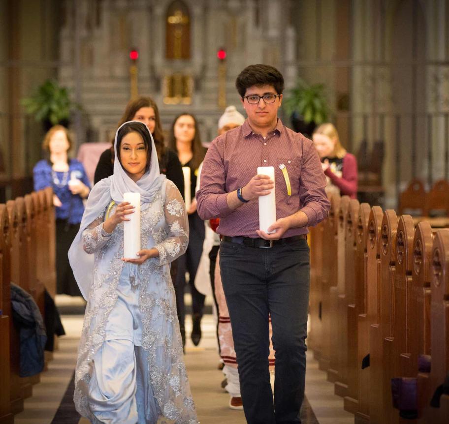 Students participating in St. John's church service