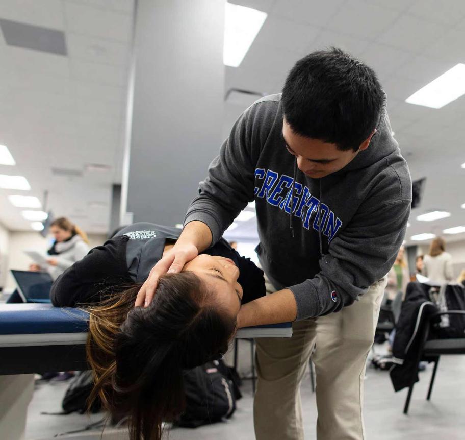 Physical therapy students learning in classroom