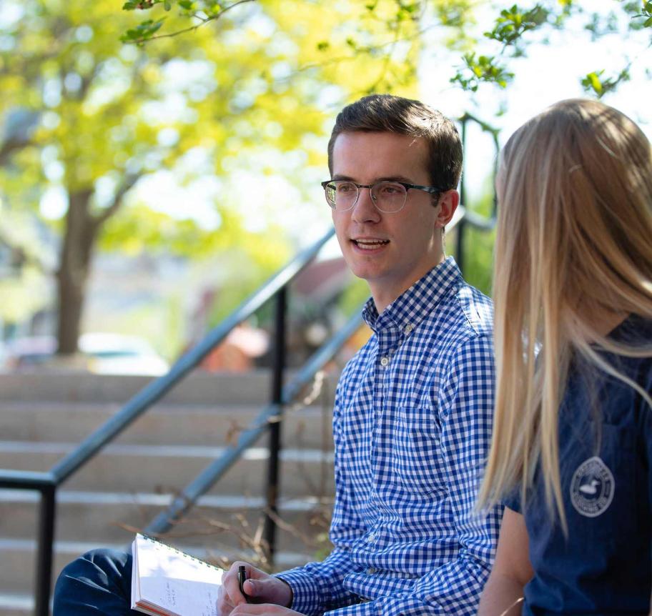 Students gathering outdoors on Creighton campus