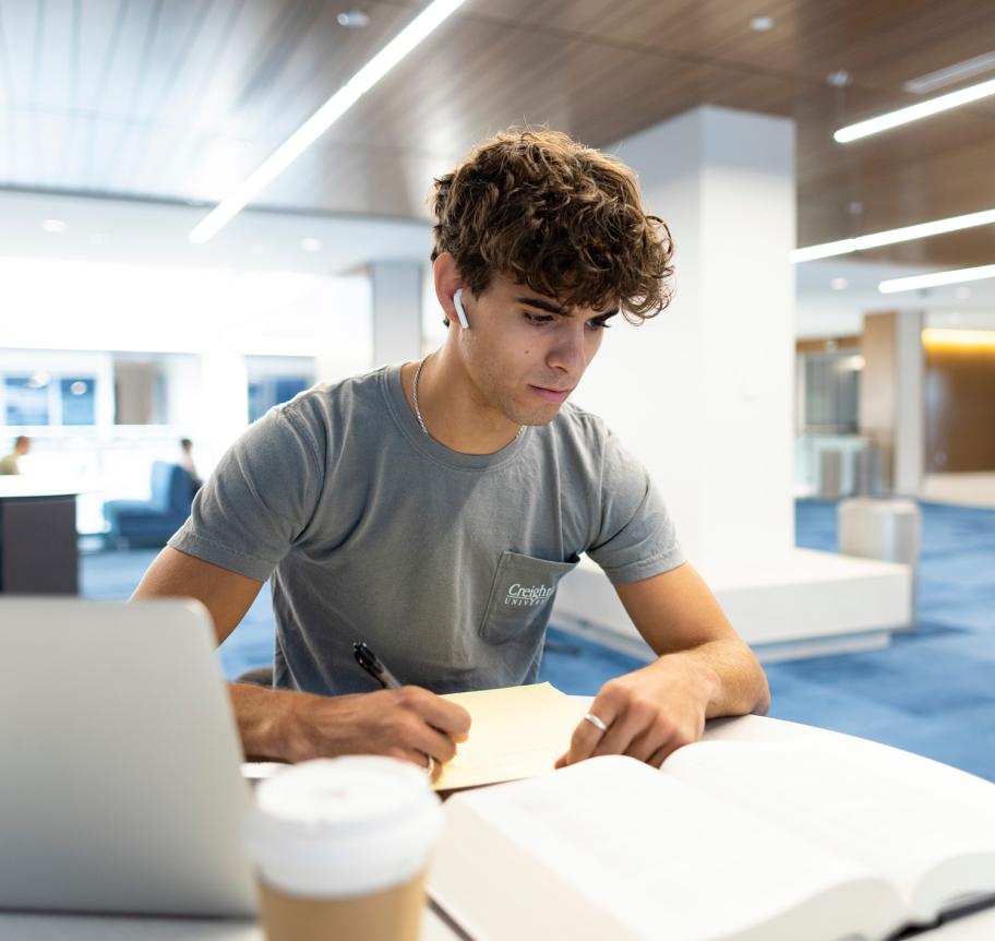 Student studying at table