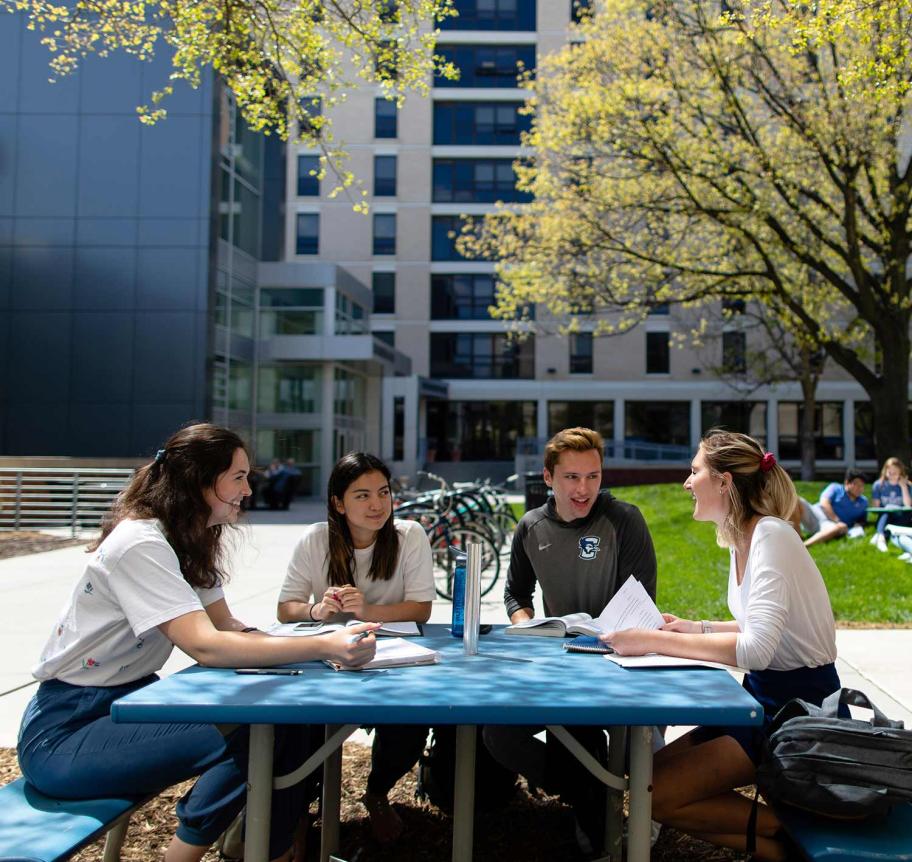 Students gathered outdoors on Creighton campus