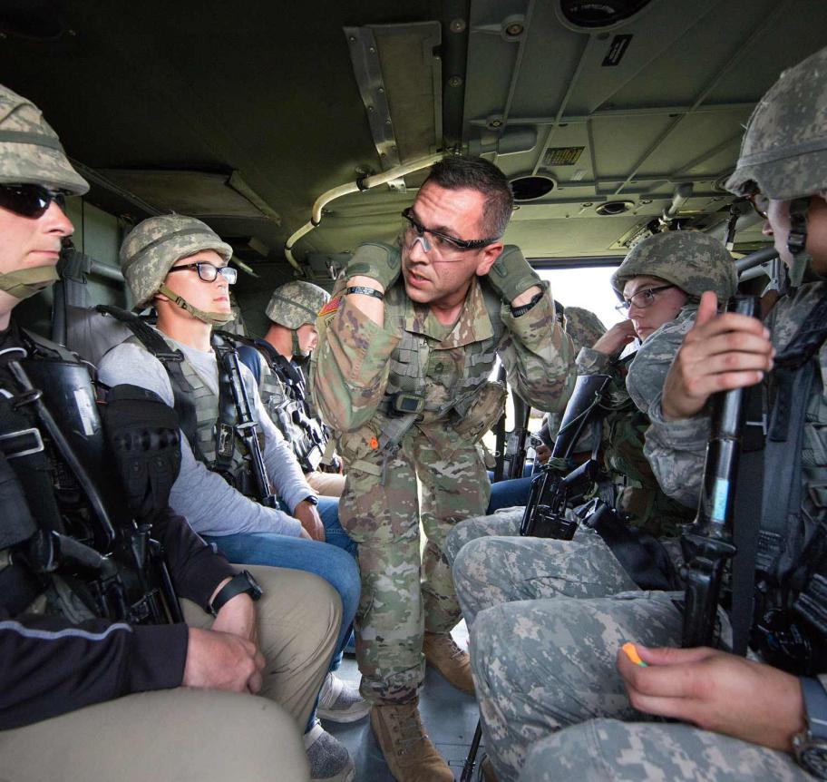Military science students in helicopter