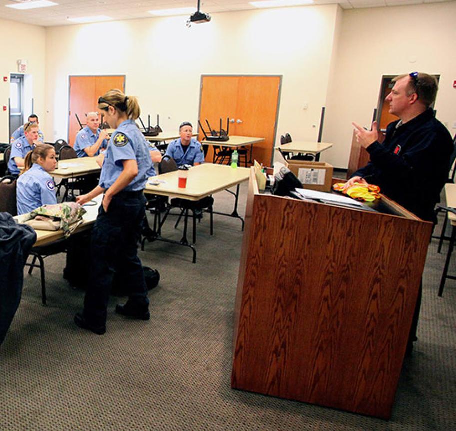 EMS instructor speaking to a class of students