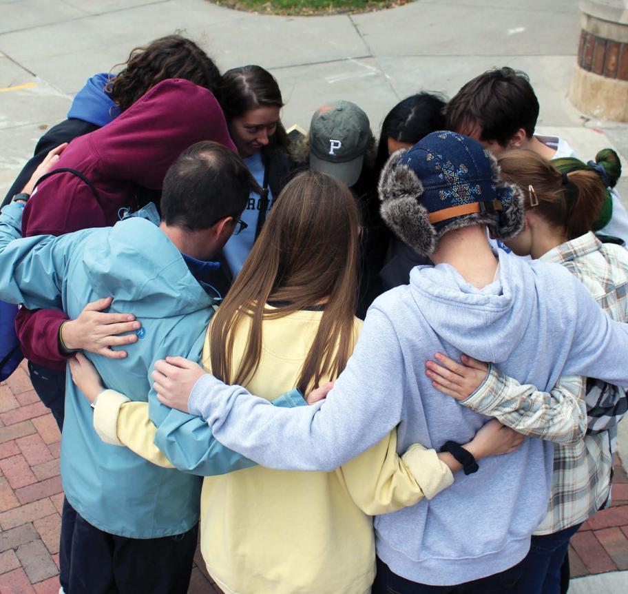 Students praying together