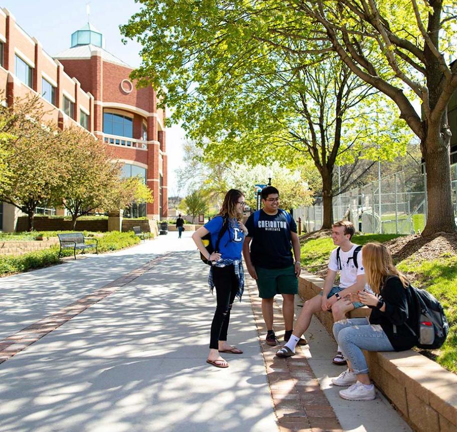 Students gathering outdoors on Creighton campus