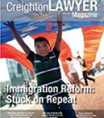 Creighton Lawyer Magazine fall 2014 cover with Immigration Reform theme