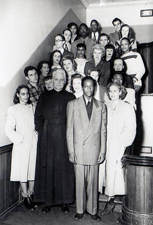 Fr. Markoe with the members of the De Porres Club in 1948