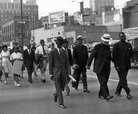 Fr. Markoe during a civil rights march with a group of people
