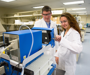 Jeffrey North, PhD, and Melanie Sowards in a lab