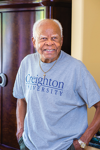 Ralph Duff smiling and wearing Creighton University t-shirt