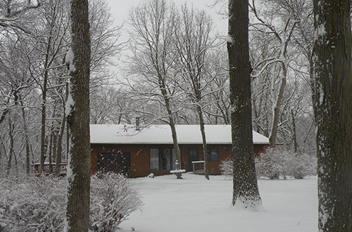 Exterior of Brebeuf Cabin during winter