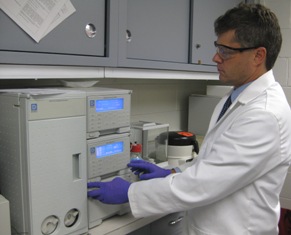 Dr. Lambert working in the exercise biochemistry laboratory