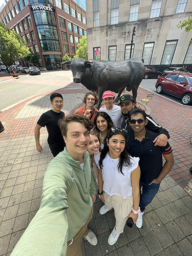 Jack Sutton and friends hanging out near the Bull statue.