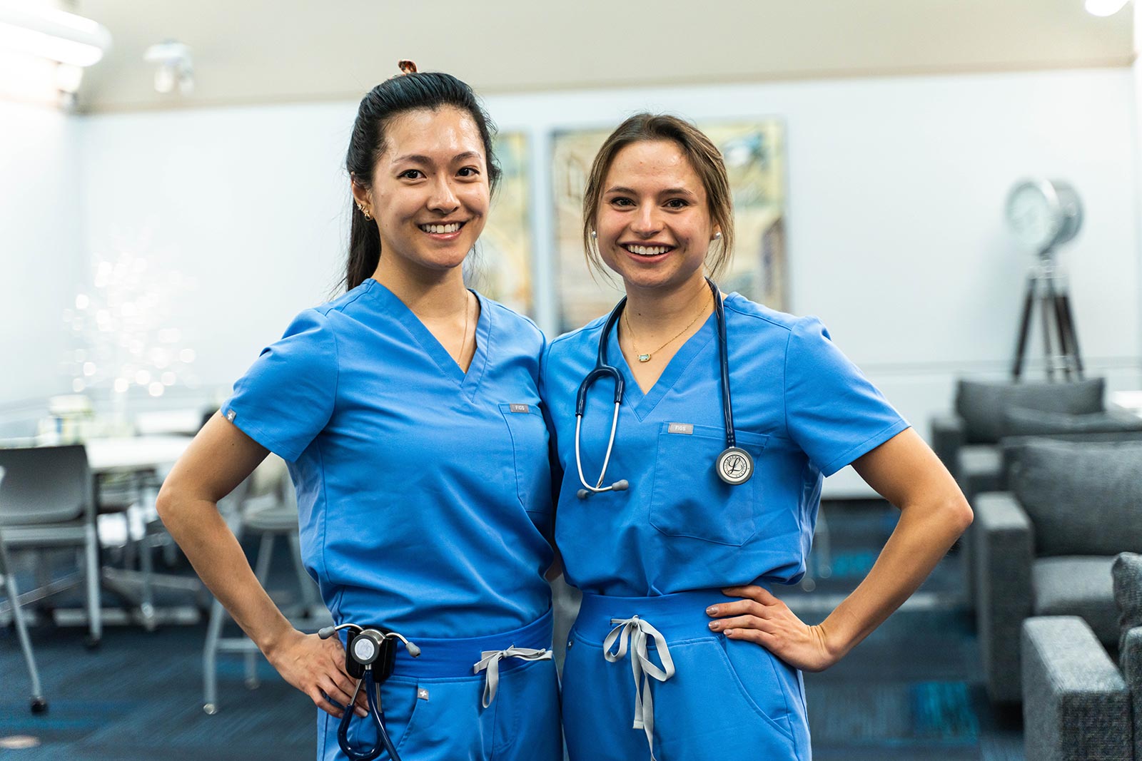 asian and white female medical students