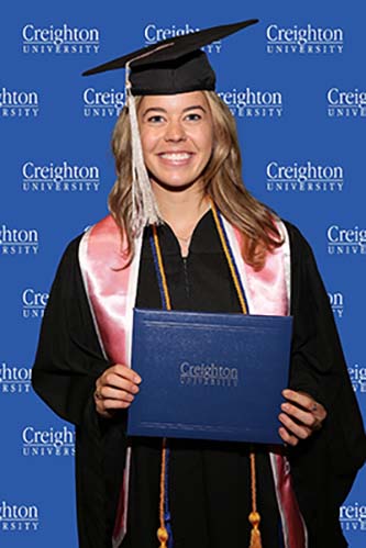 Abby Kleespie in cap and gown at commencement