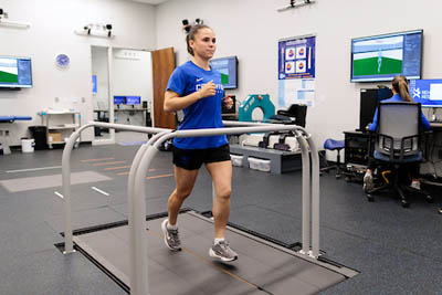student running on treadmill