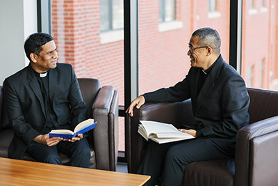 L to R: Fr. Elvin Cardoso, SJ and Fr George Meze, SJ