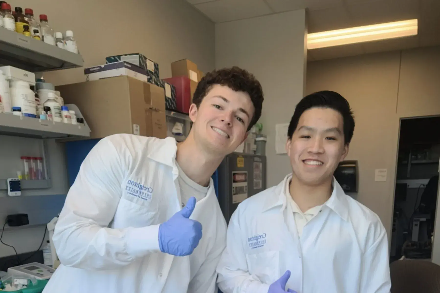 Kenneth Nguyen and friend give a thumbs up