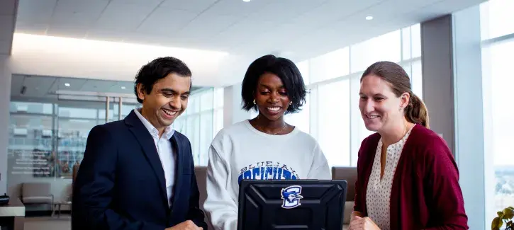 Drs. Iverson and Fernandes with Danielle Carrol, a senior computer science major