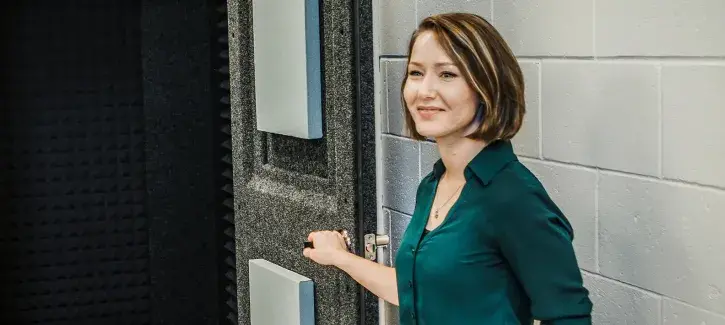 Dr. Kelsey Anbuhl in lab setting.