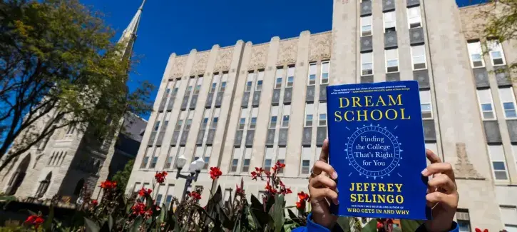 Dream School book being shown on Creighton campus