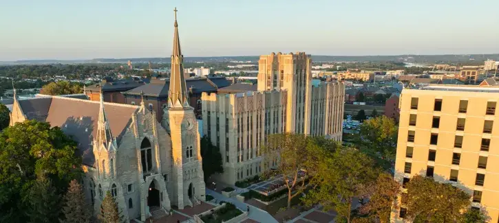 Drone shot of Creighton campus including St. John's church.