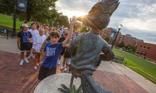 The tradition of students touching Billy Bluejay's beak