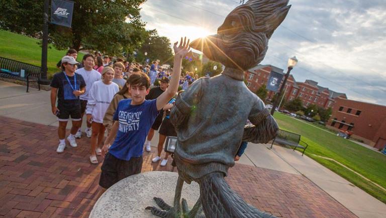 The tradition of students touching Billy Bluejay's beak