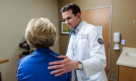 Med student in clinical research setting