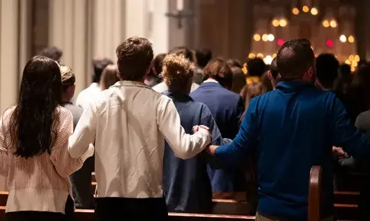 Students worshipping together on campus.