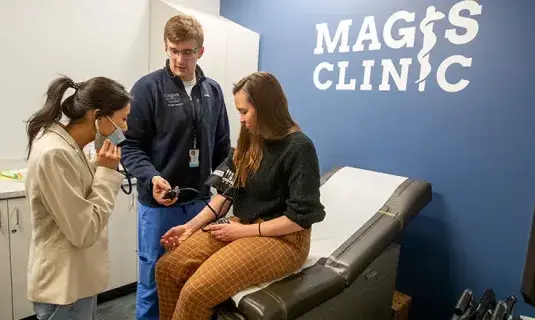 Helping those in need of healthcare at Magis Clinic.