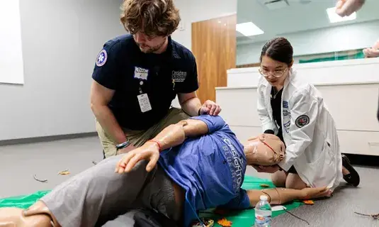 Providing care in simulation setting.