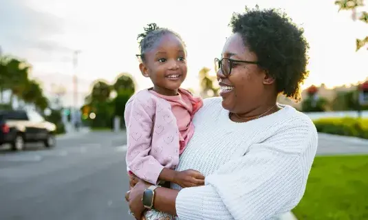 Mother holding child