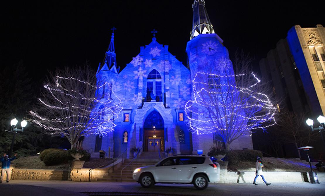 St. John's church lit up in blue for Christmas