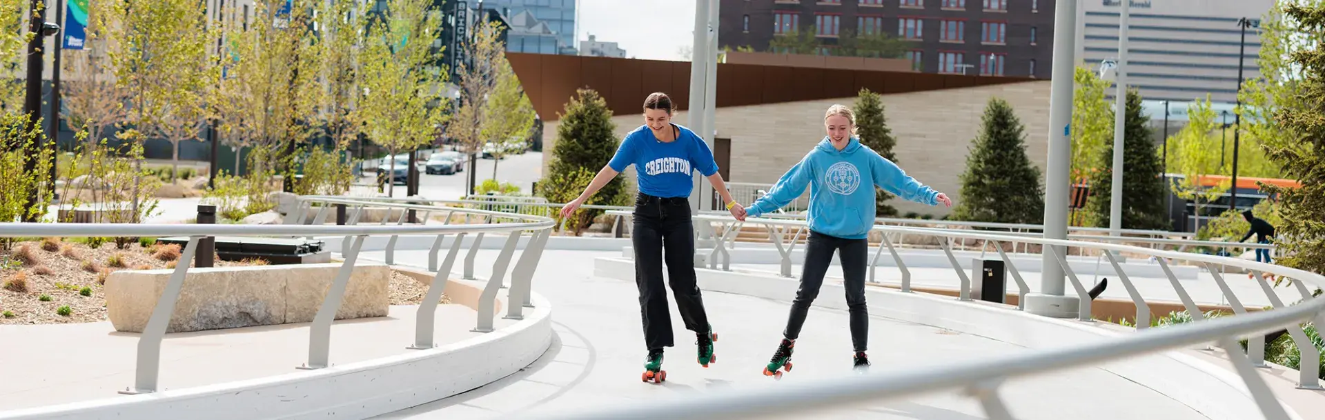 Students rollerskating downtown