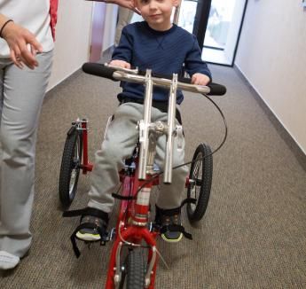 Pediatric patient riding bike