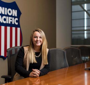 Student intern at Union Pacific sitting at conference table