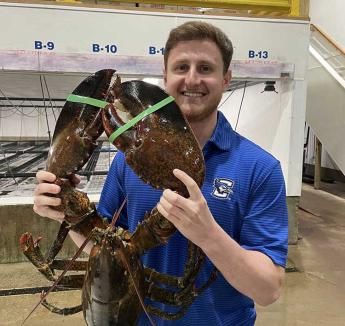 Ben Segal holding lobster