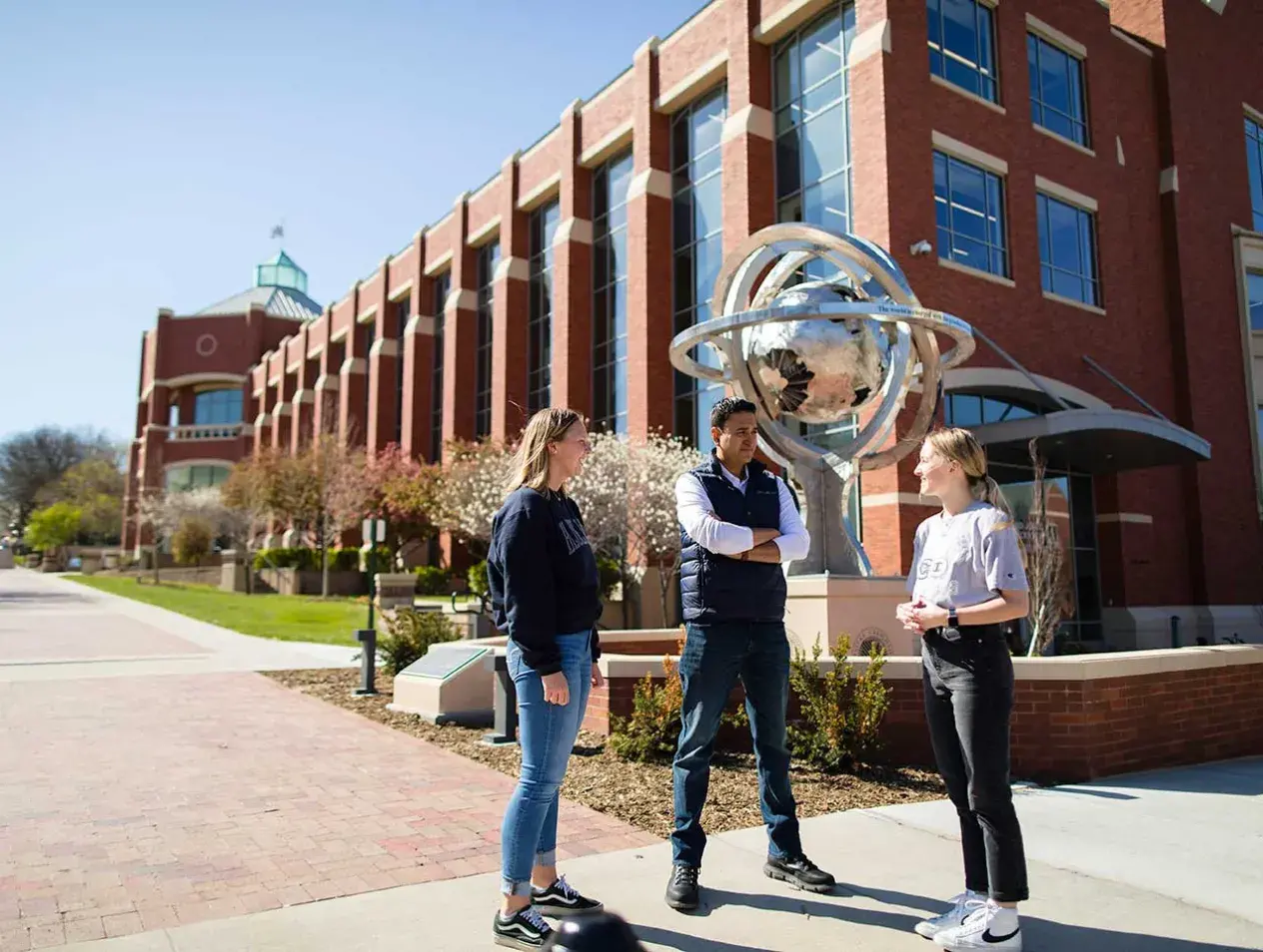 Creighton business students gathered outdoors