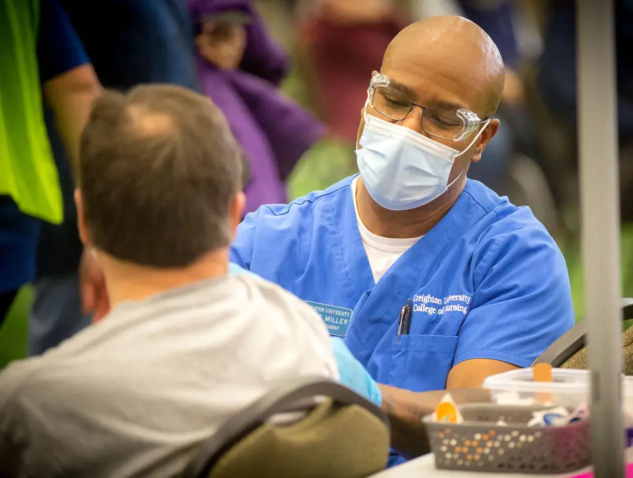 COVID-19 vaccination clinic volunteer