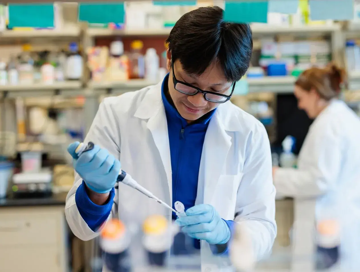 Medical Microbiology and Immunology student in lab setting