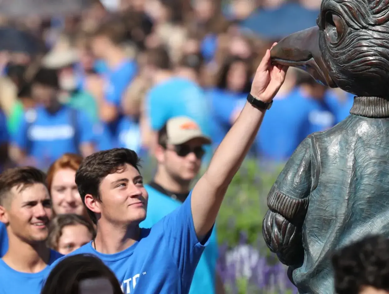 creighton-university-student-touching-billy-bluejay
