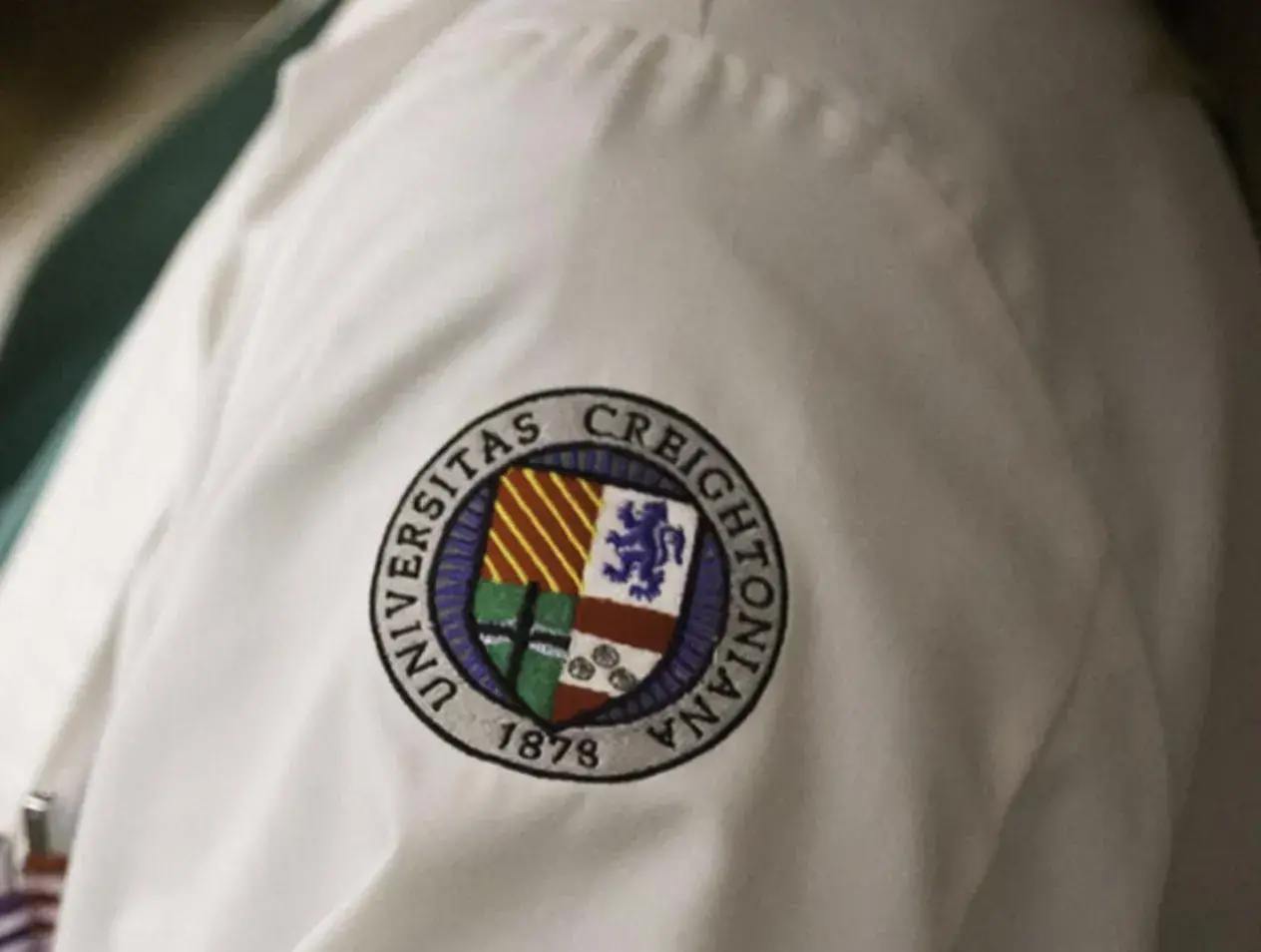 White coat Creighton badge